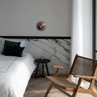 Eclipse 150 Wall Lamp installed in modern bedroom interior