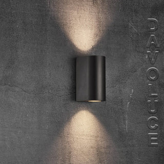 Canto Maxi 2 Wall Light has a minimalist design which makes the lamp both decorative and sculptural. We have one of the largest selection of exterior up and down wall lights in Australia. Outdoor brass up & down wall lights.  Architectural external light