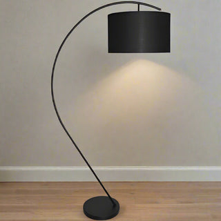 Black arc floor lamp with a black shade on a white background