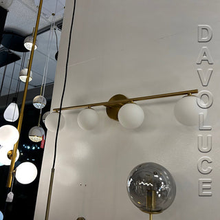 Telbix Moran 4 Lights Antique Gold Wall Light With Opal Glasses. Modern wall lights for bathroom mirrors, Picture lights, Black vanity mirror lights. Best selection of wall lights for bathroom in Australia available from Davoluce Lighting