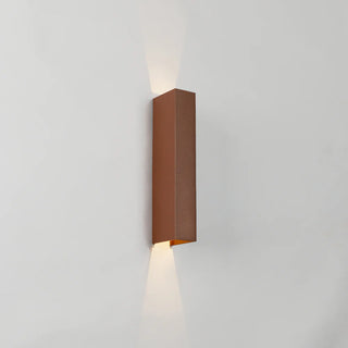 Ryland Exterior Wall Light in Rust finish showing up and down LED glow, sleek rectangular outdoor wall sconce.