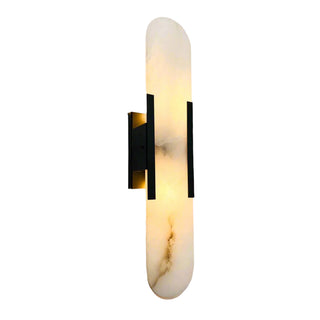 Wall-mounted light fixture with marble-like design on a plain wall