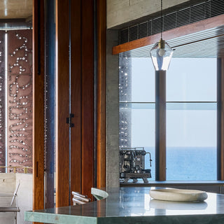 Geometric pendant light with black suspension and clear shade