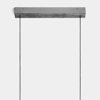Wooden shelf with metal brackets on a white background