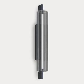 Column 500 Wall Lamp front angled view with clear fluted glass and dark brushed nickel backplate