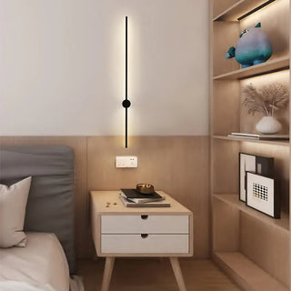 Obia 120cm LED wall light installed beside bed creating soft backlit glow