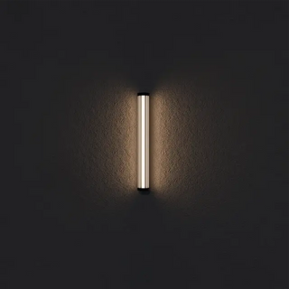 Junco black IP65 outdoor wall light installed on modern exterior facade at night