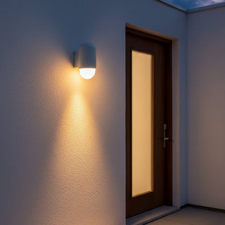 Nordlux Heka outdoor wall light illuminated on exterior wall