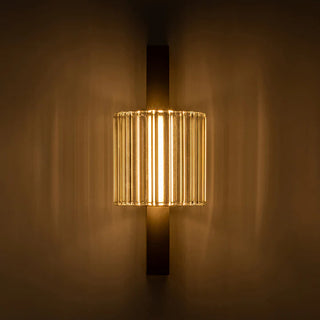 Column 250 Wall Lamp illuminated in warm 3000K light against dark background
