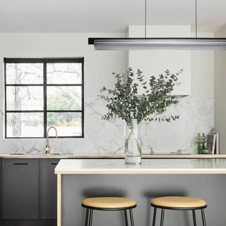 Column Linear Pendant Light used as ambient task lighting in styled interior scene