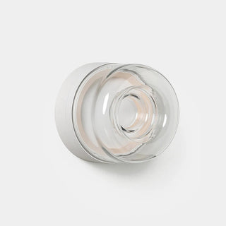 Clear glass wall sconce on a white background