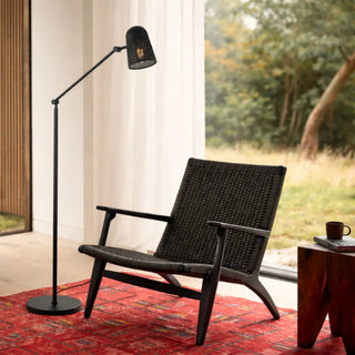 Black Cadena Floor Lamp beside lounge chair