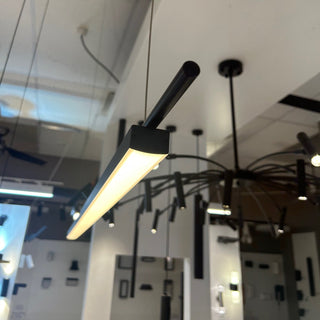 Angle view of Coln Pendant Light showing matte black finish and LED diffuser