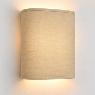 Beige Linen fabric wall light with rounded corners and matching trim, illuminated