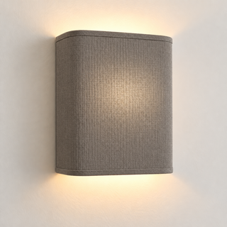Contessa Granite fabric wall light with rounded corners and matching trim, illuminated