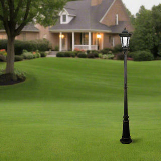 Black outdoor lamp post on a white background