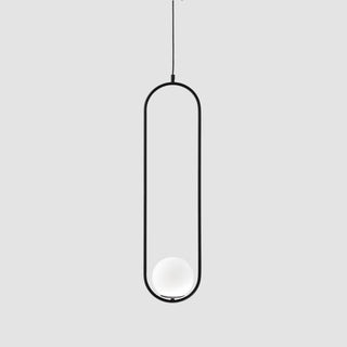 Modern pendant light with a black frame and white bulb on a gray background