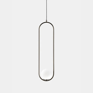 Modern pendant light with a clear glass shade on a white background