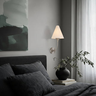 Telbix Farnix bedside wall light installed beside a modern bedroom