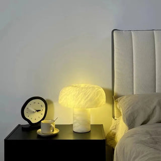 Introducing the Marbella Table Lamp, the perfect addition to your bedroom or living room. Crafted from solid polished marble, this luxurious lamp offers both style and functionality