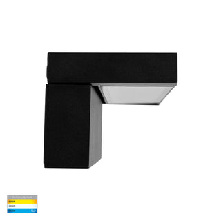 Black square wall light fixture on a white background