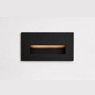 Black rectangular outdoor light fixture on a white background