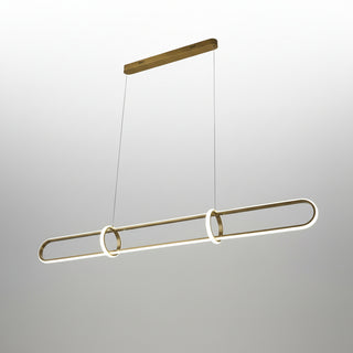Modern chandelier hanging from a ceiling in a stylish interior setting.