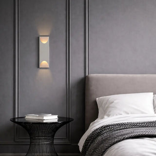 Telbix Mazal white wall light shown in an interior setting.
