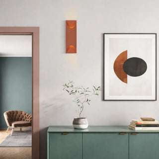 Telbix Mazal terracotta wall light shown in an interior setting.
