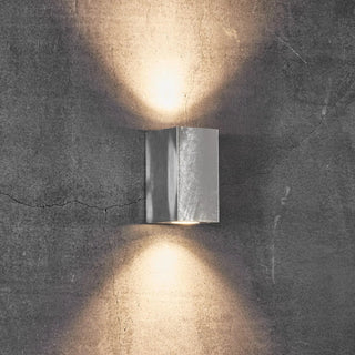 Canto Maxi Kubi 2 Galvanized – installed on outdoor facade dusk scene