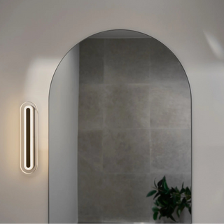 Nordlux Cavara black LED wall light installed vertically above bathroom mirror