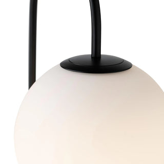 Mintu Floor Lamp with travertine base and frosted glass shade in Black finish