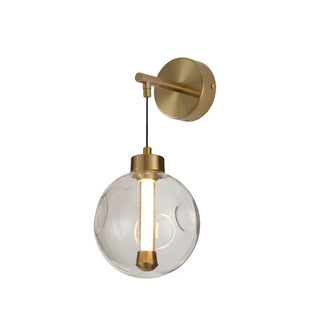 Gold wall sconce with clear glass shade on a white background