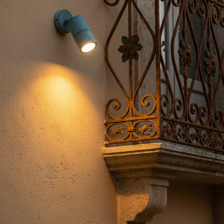 CLA Patina Brass Adjustable Wall Light installed on a wall