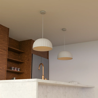Rachis white polymer resin pendant lights above a contemporary kitchen island
