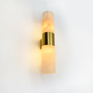 Wall-mounted light fixture with gold and beige design on a white background