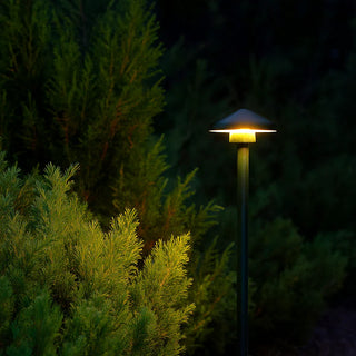 Telbix SCAPE LED Post Light illuminating garden at night