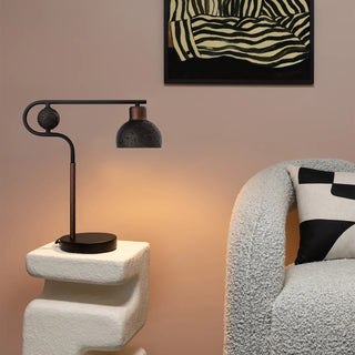 Solaris Table Lamp – lifestyle scene beside chair