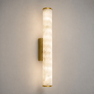 Tubula Brass 40cm marble look LED wall light illuminated on white wall