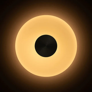 UFO Wall Lamp glowing warm light on wall, 3000K