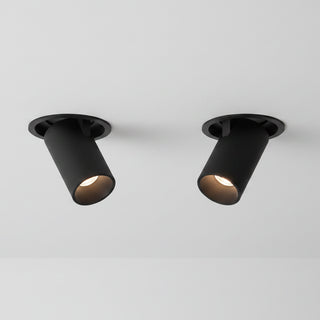 A modern matte black cylindrical recessed spotlight ceiling fixture shown at an angle against a solid white background.
