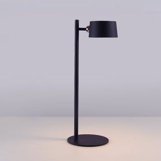 Black floor lamp with adjustable head on a light gray background