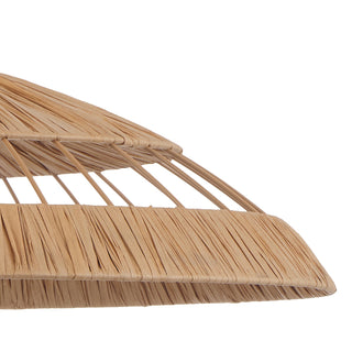 Close-up of a thatched roof structure on a white background