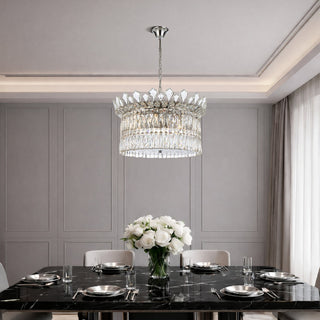 Large Virell crystal pendant above dining table in luxury interior setting