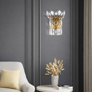 Gold Virell crystal wall light installed in elegant living room interior