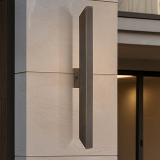 Vostel linear exterior light installed on exterior stone wall