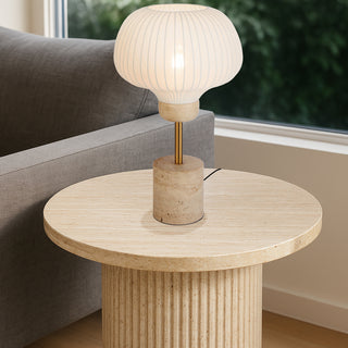 Telbix Vibor Decorative table lamp on a round wooden table with a blurred background
