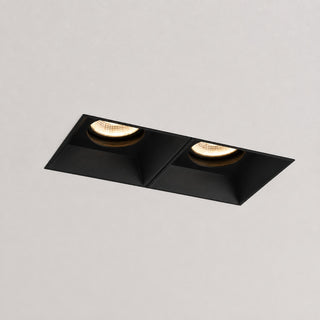 Trimless twin adjustable architectural downlight installed in plaster ceiling