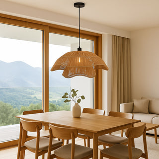  Natural raffia pendant light hanging above a wooden dining table in a modern open-plan living and dining room with neutral tones, minimalist furniture, and a mountain view through large sliding glass doors.