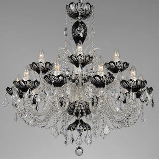 A multi-tiered black and clear crystal chandelier with lit candle-style bulbs, shown against a plain gray background.